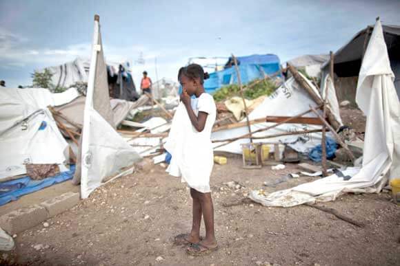 Haitians continue to live among ruins