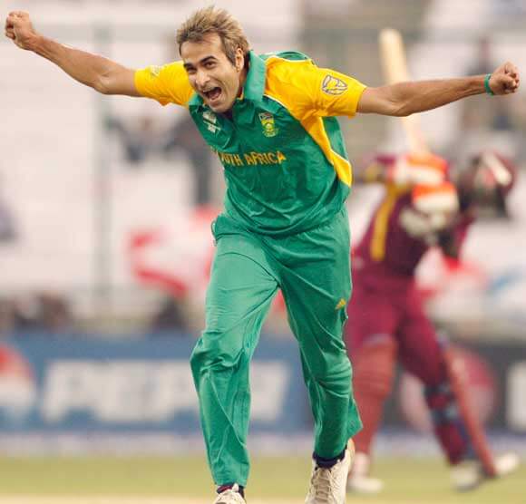 South Africa's Imran Tahir celebrates after dismissing West Indies batsman Devon Thomas, right background, during their Cricket World Cup Group B match in New Delhi, India, Thursday, Feb. 24, 2011.