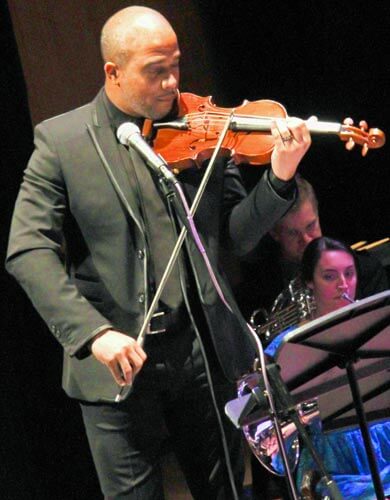 Violinist Roumain continues to cross cultures, mix genres