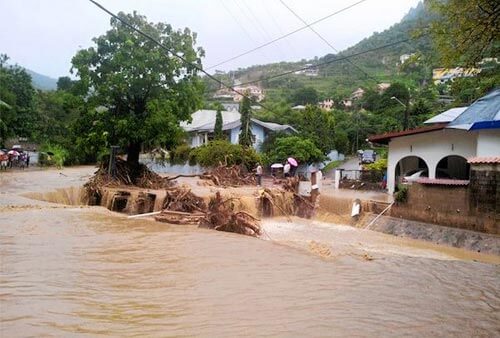 In Trinidad, causes debated as flooding worsens