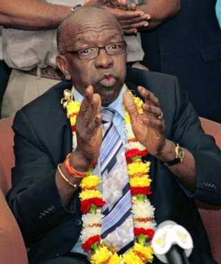 WARNER BACK IN POWER