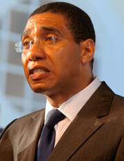 Jamaica opposition leader fends off challenge