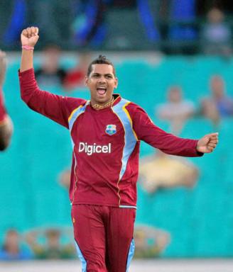 West Indies Sunil Narine celebrates taking the wicket of Australia's Aaron Finch during their One-Day International Cricket match against Australia in Sydney, Australia, Friday, Feb. 8, 2013.