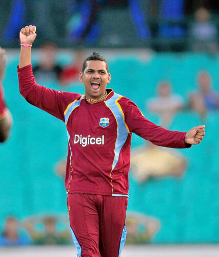 West Indies Sunil Narine celebrates taking the wicket of Australia's Aaron Finch during their One-Day International Cricket match against Australia in Sydney, Australia, Friday, Feb. 8, 2013.