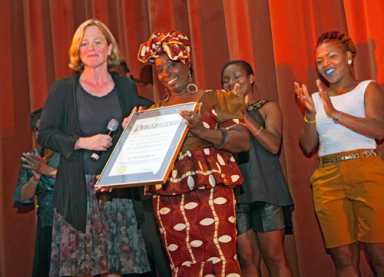 Queens Borough President Malinda Katz presents Artistic Director of Impressions Dance Theatre Ms. Verna Walcott-White with a Proclamation in celebration of the school's 12th Annual Dance Recital at the Jamaica Performing Center.