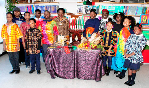 Sankofa pupils lead pre-Kwanzaa celebration