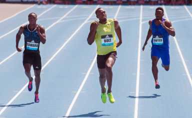Bolt wins but unhappy