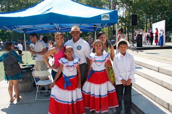 Adams leads unity parade of global flags