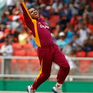 West Indies' Sunil Narine celebrates after bowling out Australia batsman for 2 runs during their third one day international cricket match in Kingstown, St. Vincent, Tuesday March 20,2012.