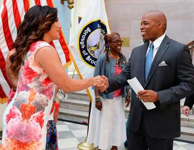 Adams honors baker, educator