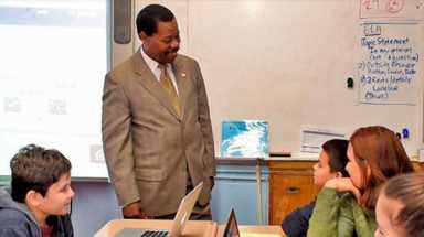 Eugene tours community to discuss education, healthcare