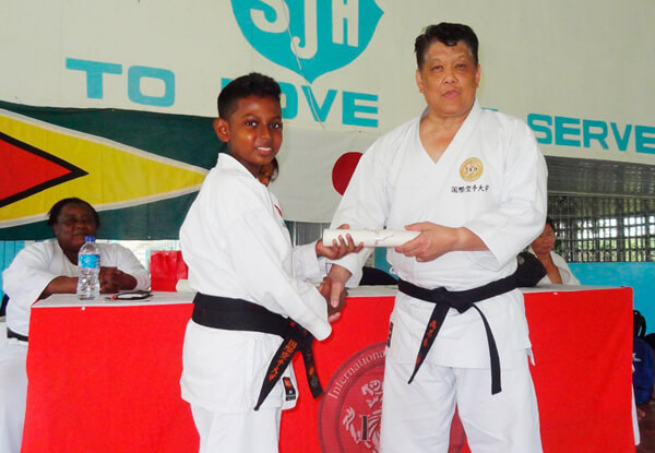 Young black belt popularizes karate in Guyana|Young black belt popularizes karate in Guyana
