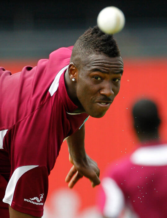 West Indies Andre Russell bowls during a practice session in Gros Islet, St. Lucia.