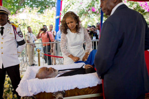 Haiti’s ex-president buried despite calls to wait|Haiti’s ex-president buried despite calls to wait