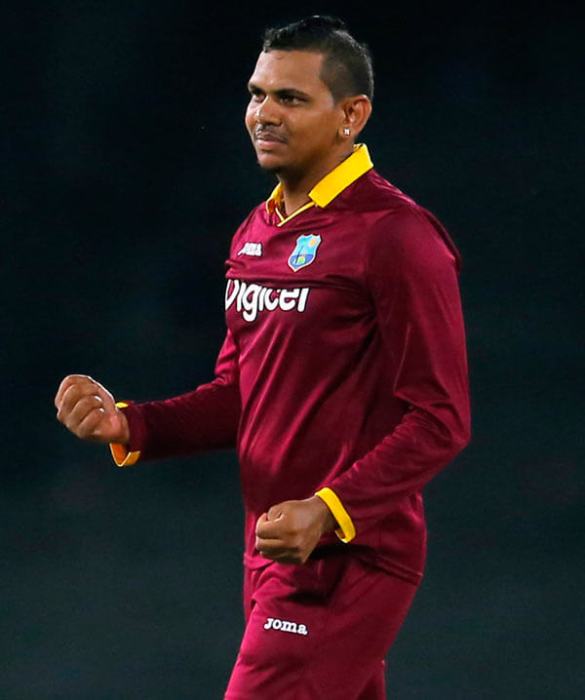 West Indies' Sunil Narine celebrates the dismissal of Sri Lanka’s Shehan Jayasuriya during their first one day international cricket match in Colombo, Sri Lanka, Sunday, Nov. 1, 2015.