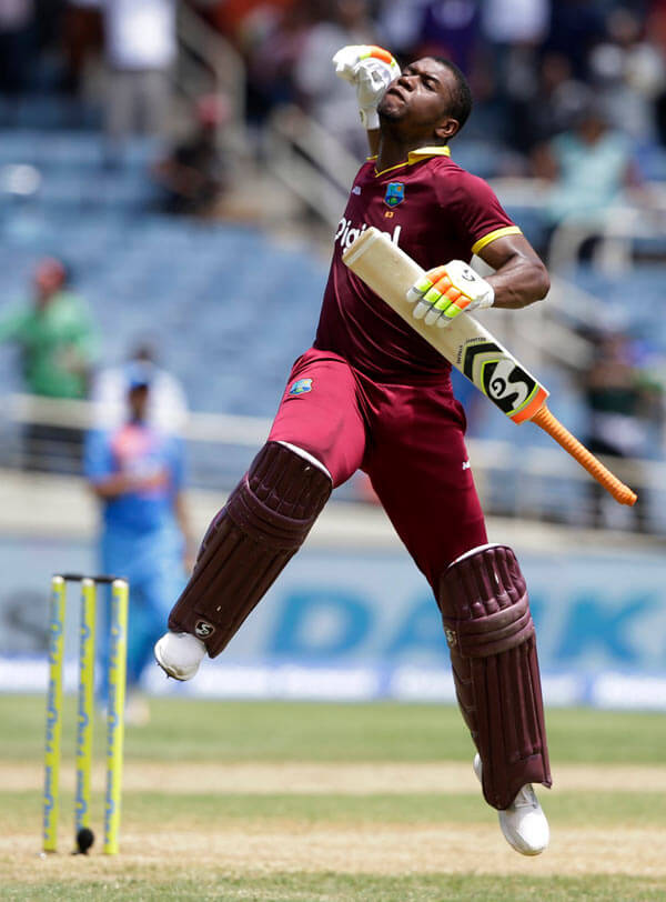 Lewis slams record-breaking century|Lewis slams record-breaking century