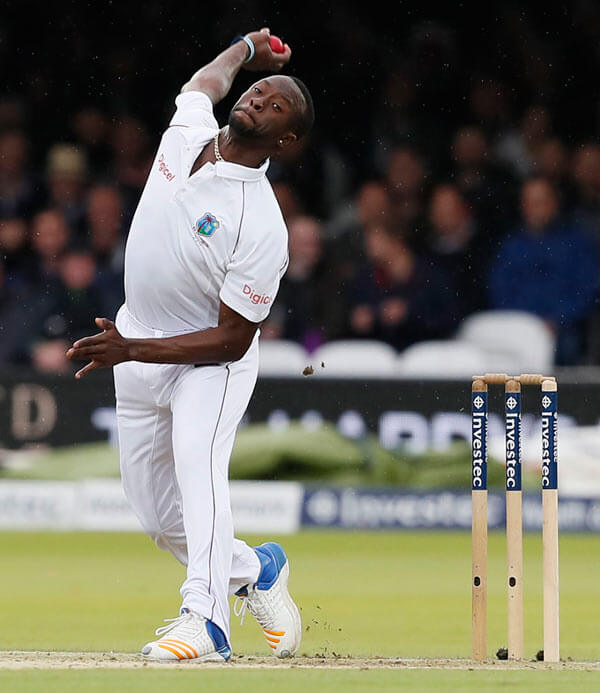 West Indies, Kemar Roach bowls on the second day of the third test match between England and the West Indies at Lord's cricket ground in London.