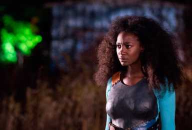 Caribbean female superhero saves her community