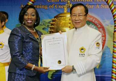 Guyana consul general rings Peace & Love bell|Guyana consul general rings Peace & Love bell