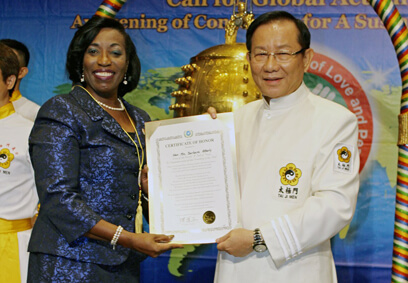 Guyana consul general rings Peace & Love bell|Guyana consul general rings Peace & Love bell
