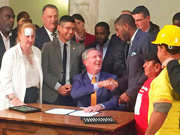 Mayor signs construction safety bill into law
