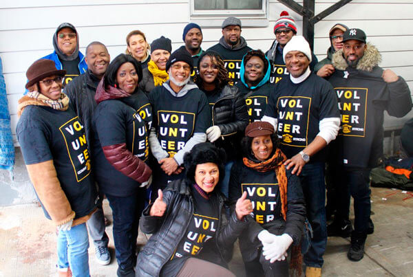 QCAANY Chapter brings Christmas cheer to Calvary’s Mission Food Pantry