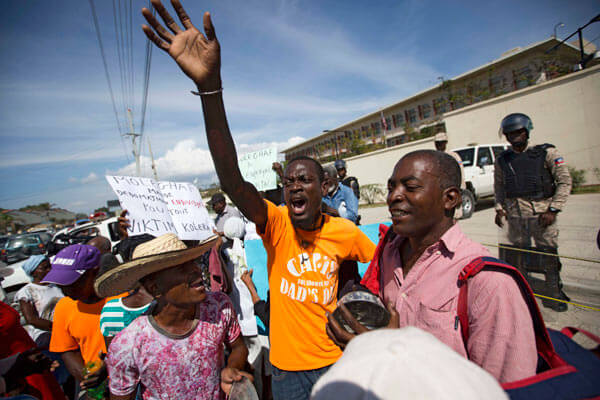 Protesters in Haiti condemn Trump remarks at embassy protest|Protesters in Haiti condemn Trump remarks at embassy protest