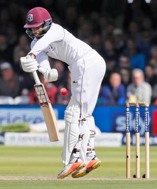 West Indies Shai Hope plays a shot off the bowling of England's Stuart Broad on the third day of the third test match between England and the West Indies at Lord's cricket ground in London, Saturday, Sept. 9, 2017.