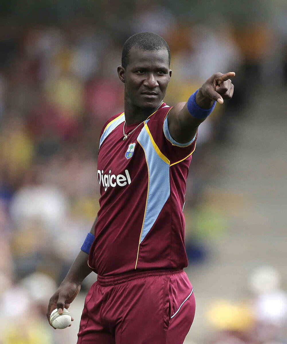 Former West Indies captain Darren Sammy gestures during their One-Day International Cricket match against Australia in Canberra, Australia.