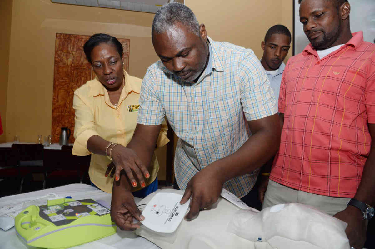 Team Jamaica Bickle donates defibrillators to Jamaican high schools|Team Jamaica Bickle donates defibrillators to Jamaican high schools