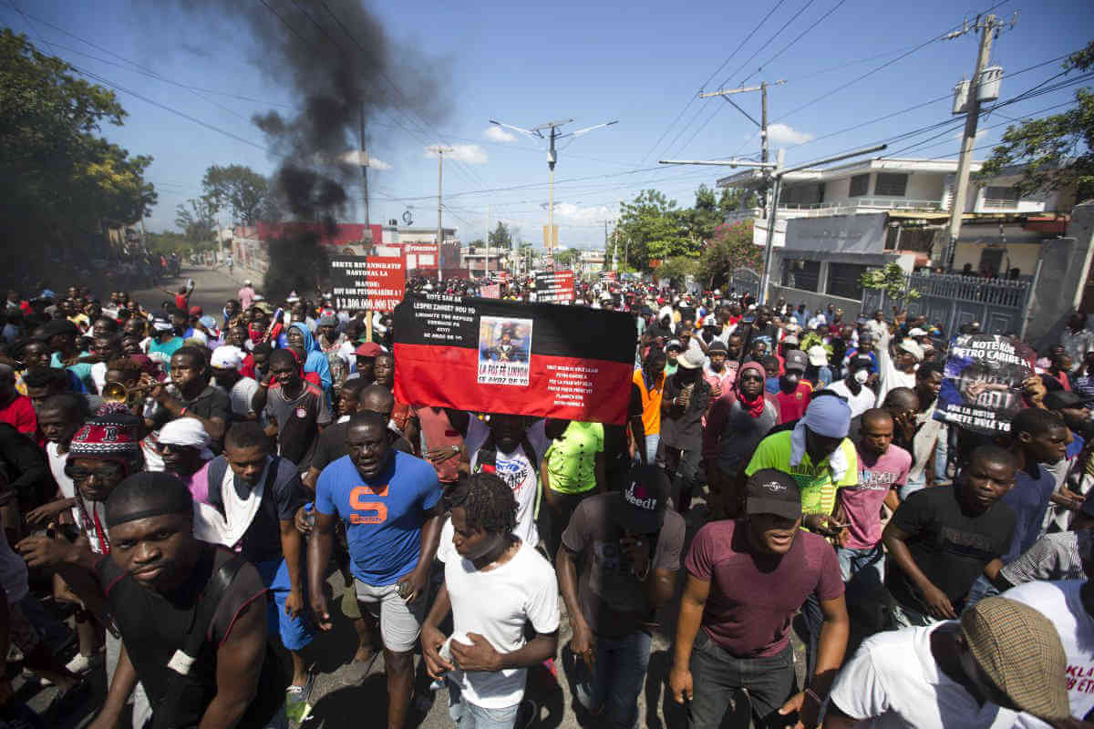 Police: 2 dead, dozens injured in protests across Haiti