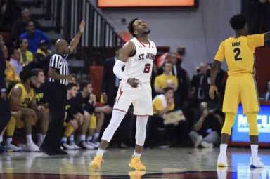 Ponds scores 26 as St. John’s routs No. 16 Marquette 89-69