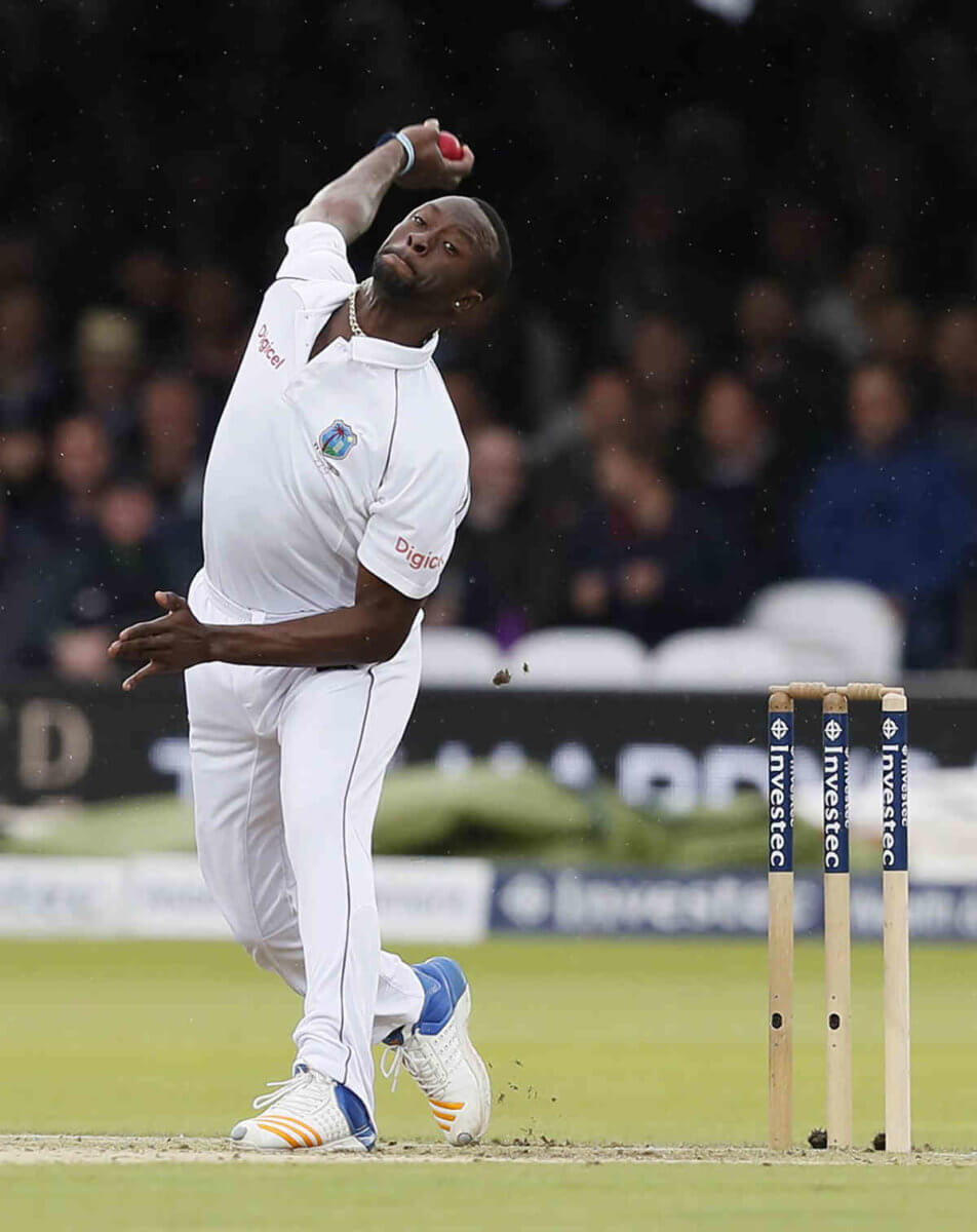West Indies, Kemar Roach bowls on the second day of the third test match between England and the West Indies at Lord's cricket ground in London.