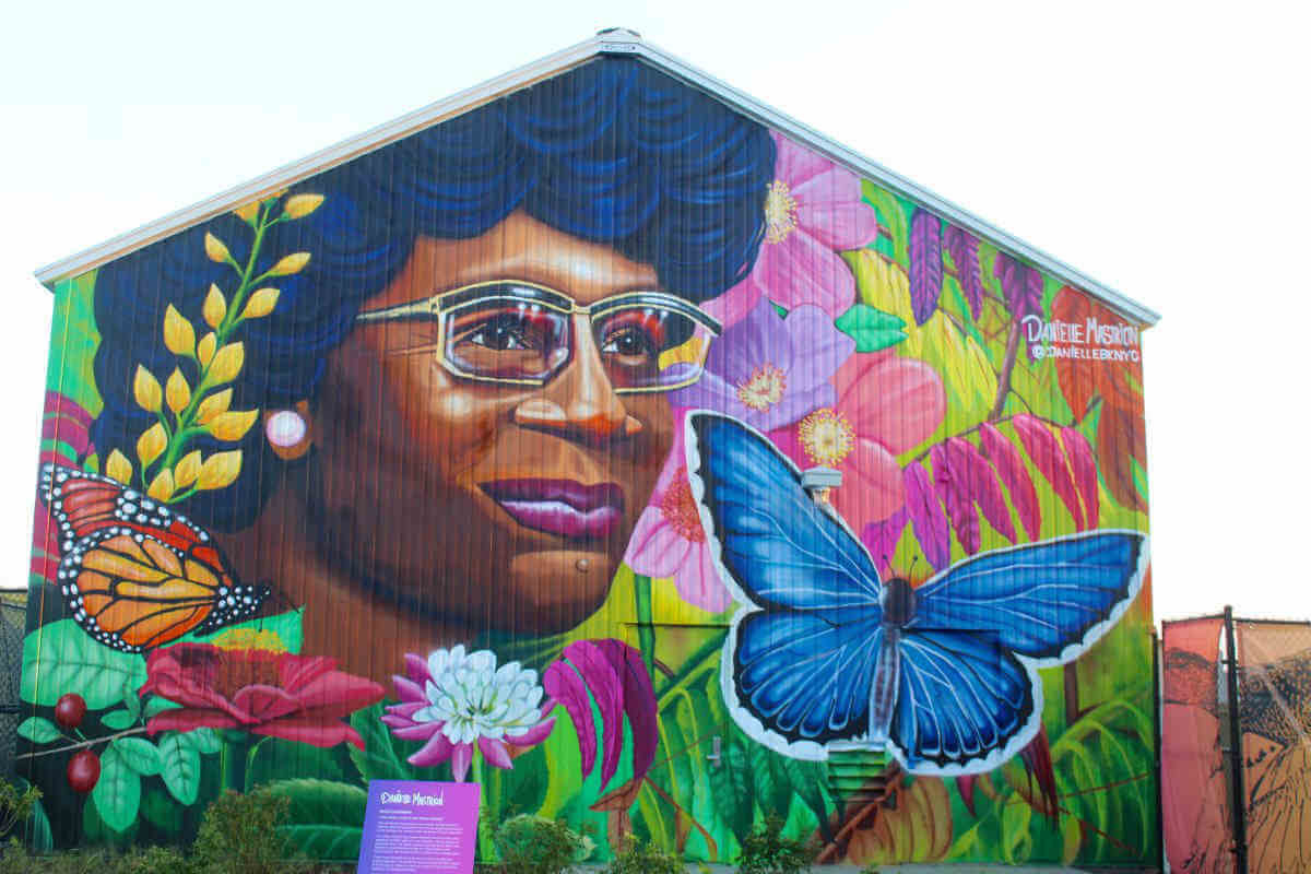 A mural of Shirley Chisholm adorns the Shirley Chisholm State Park entrance in Brooklyn.