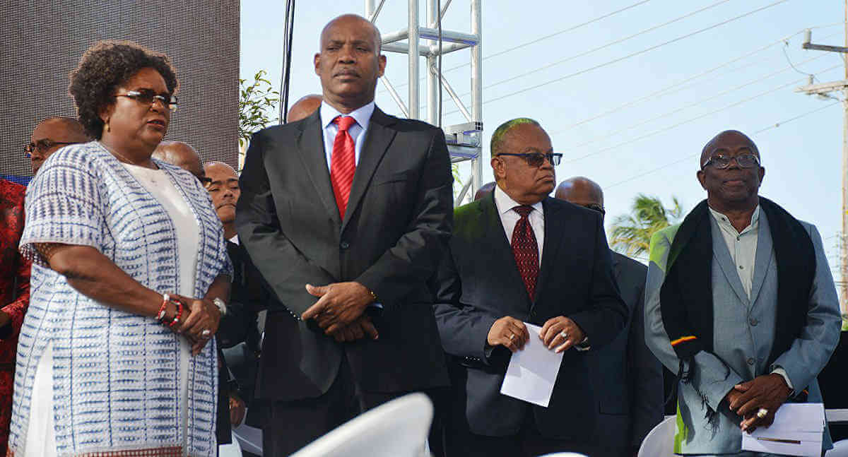 From left: Prime Minister Mia Mottley standing with cabinet ministers Dale Marshall, Jerome Walcott and Trevor Prescod.