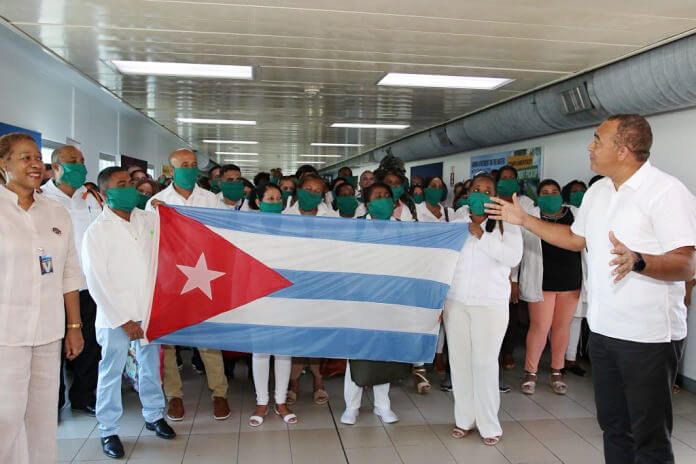Cuban medics arrive in Jamaica to help the country in its fight against coronavirus.