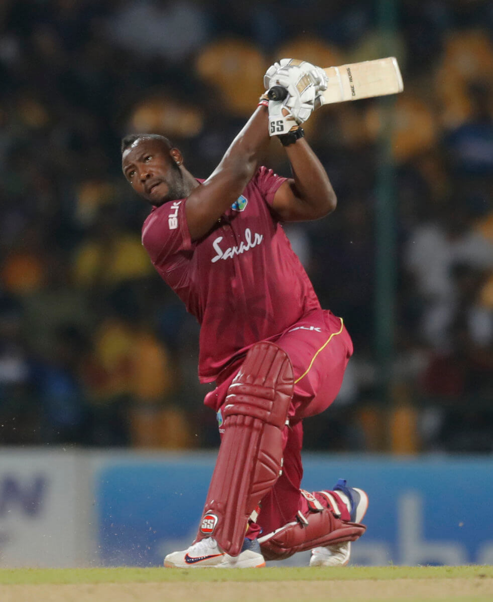 West Indies' batsman Andre Russell plays a shot against Sri Lanka during their first Twenty20 cricket match in Pallekele, Sri Lanka, Wednesday, March 4, 2020.