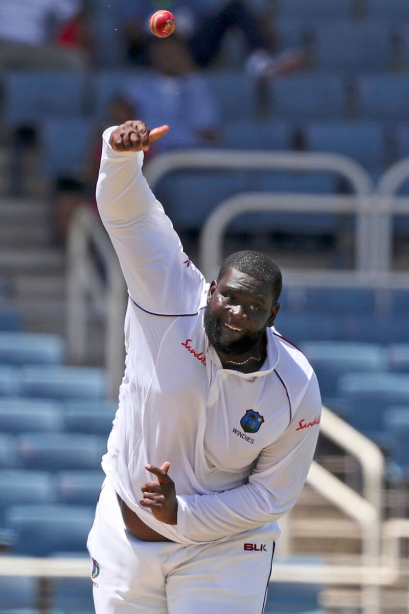 West Indies' Rahkeem Cornwall bowls against India during day one of the second Test cricket match at Sabina Park cricket ground in Kingston, Jamaica Friday, Aug. 30, 2019.