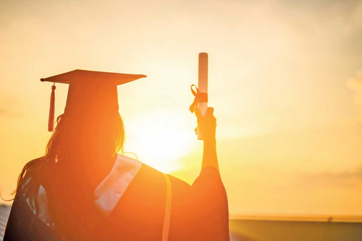 Graduates wear a black hat to stand for congratulations on graduation