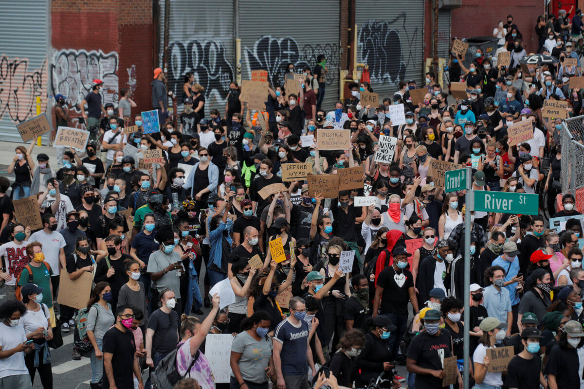 People take part in a Black Lives Matter protest in the Brooklyn borough of New York City