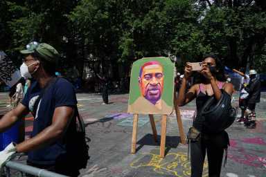 An image of George Floyd is pictured in “City Hall Autonomous Zone” in support of “Black Lives Matter” in the Manhattan Borough of New York City