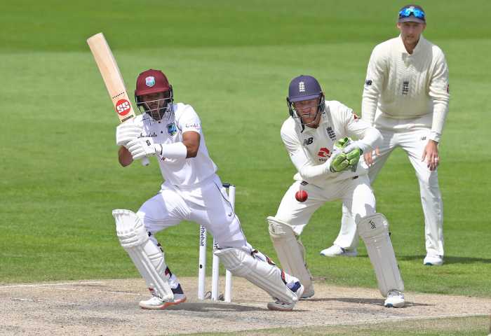 West Indies' Shai Hope in action as England's Jos Buttler looks on during the second Test between England and the West Indies at the Emirates Old Trafford, Manchester, Britain on July 19, 2020.