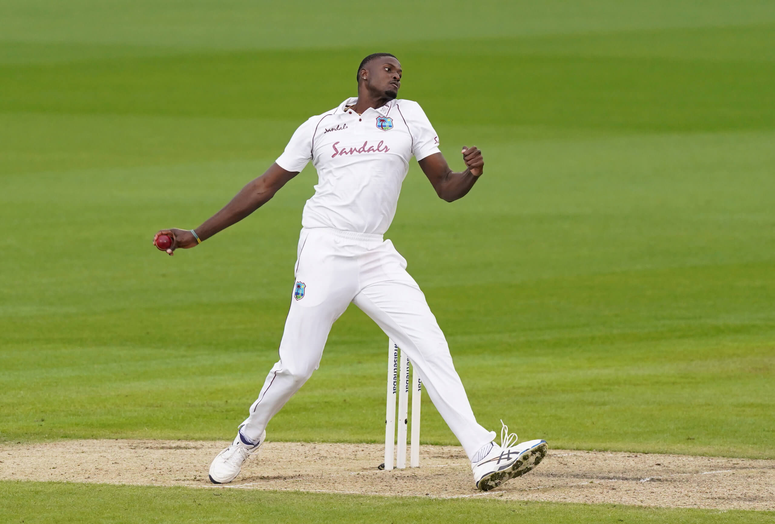 West Indies' Jason Holder in action, as play resumes behind closed doors following the outbreak of the coronavirus disease (COVID-19) during the Second Test between England v West Indies at the Emirates Old Trafford, Manchester, Britain on July 16, 2020.