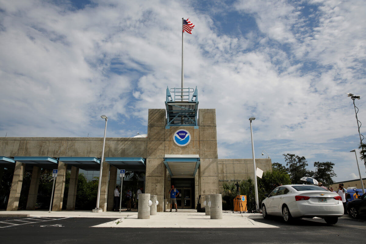 FILE PHOTO: The logo of the National Oceanic and Atmospheric Administration is seen at the National Hurricane Center in Miami
