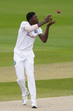 West Indies' Alzarri Joseph prepares to bowl his next delivery during the last day of the second cricket Test match between England and West Indies at Old Trafford in Manchester, England, Monday, July 20, 2020.