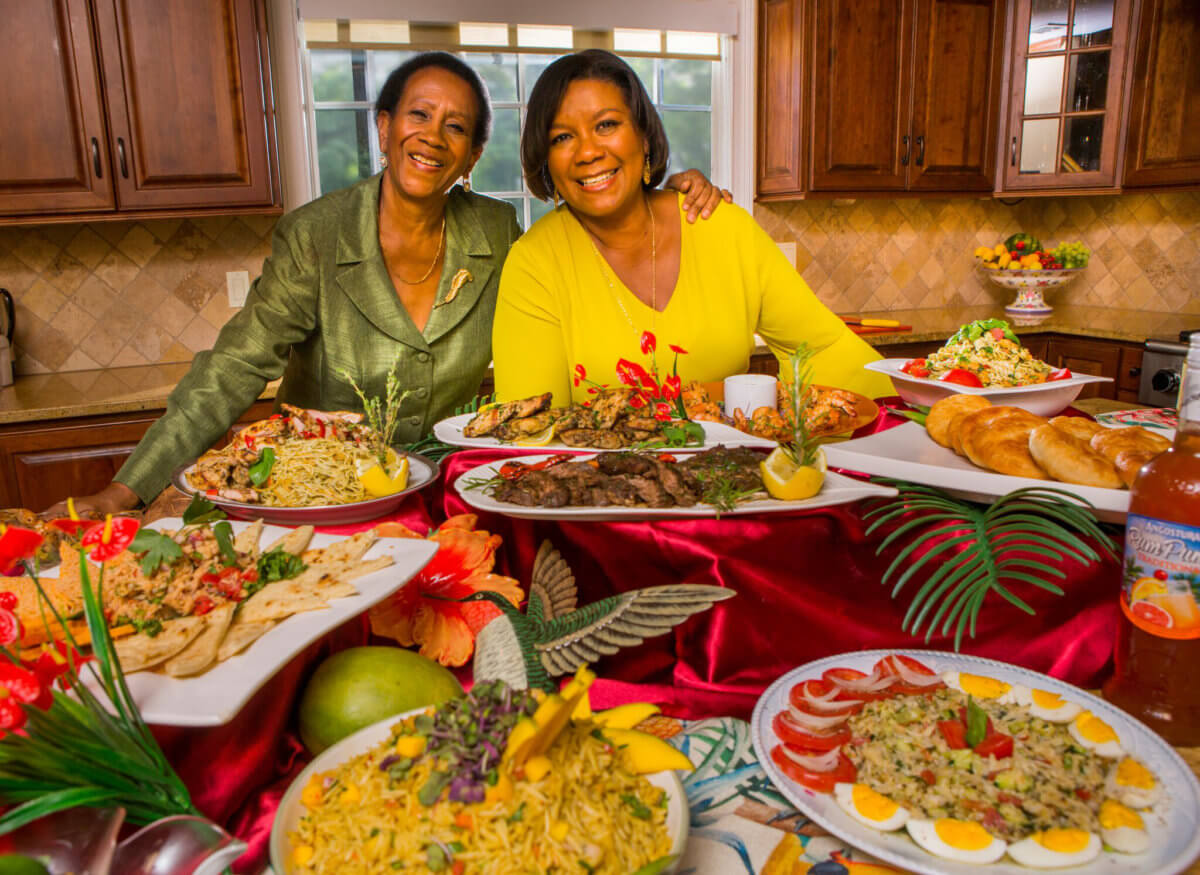 Auntie Mavis and Kiah Sandler with a sample of dishes.