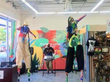 From left to right Tropicalfete Charles Watts, Ricardo Greenaway, and Ava vibing at the Flatbush Caton Market