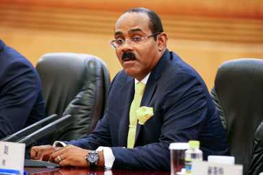 Prime Minister of Antigua and Barbuda Browne attends a signing ceremony with his China’s Premier Li at the Great Hall of the People in Beijing