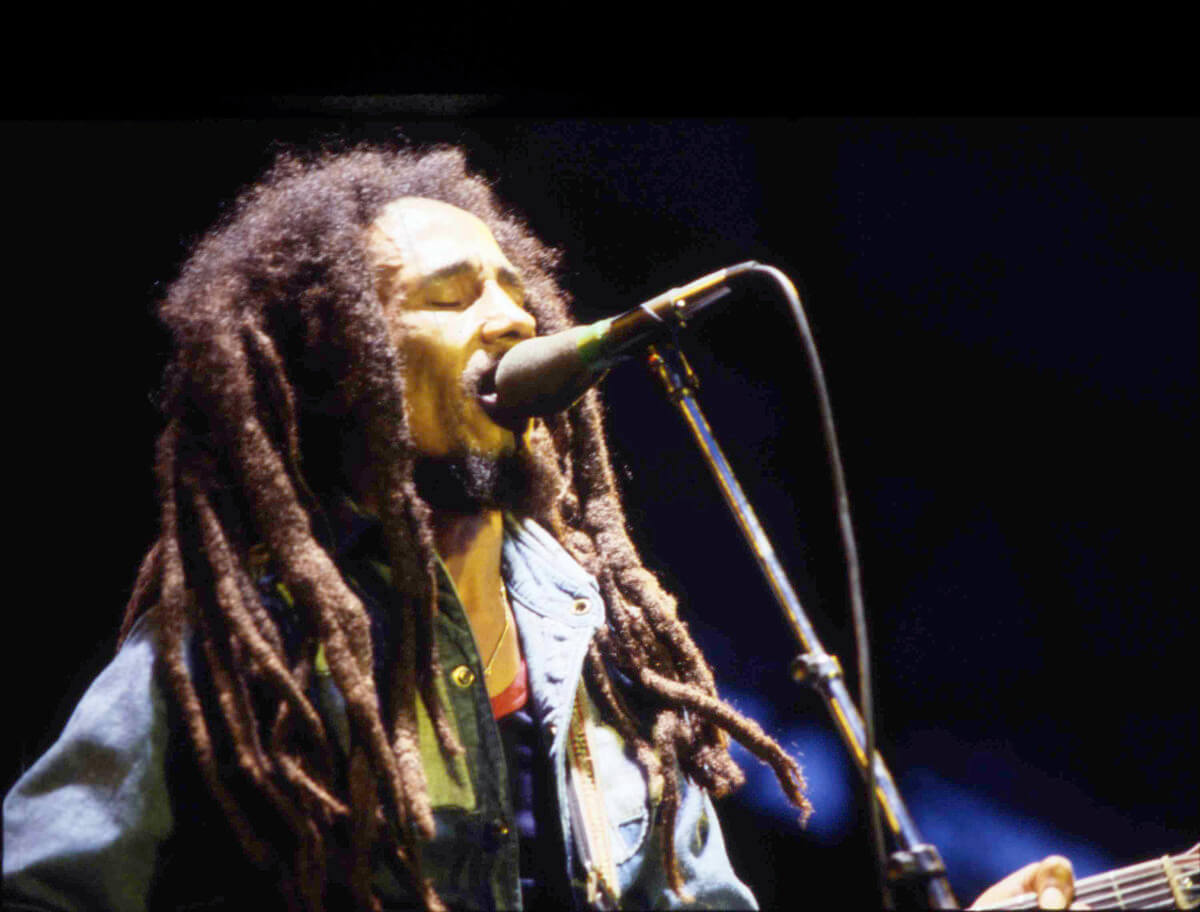 The late Jamaican Reggae singer Bob Marley performing on stage during a concert in Bourget, Paris, on July 3, 1980.