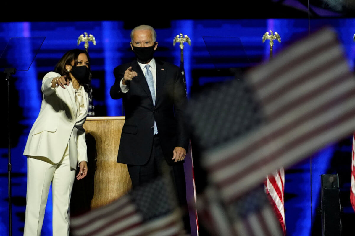 Democratic vice-presidential nominee Kamala Harris introduces Democratic 2020 U.S. presidential nominee Joe Biden at an election rally, after news media announced that Biden has won the 2020 U.S. presidential election, in Wilmington, Delaware